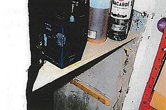The hole in the home of violent paedophile Michael Dunn which he used to conceal a girl he was abusing.