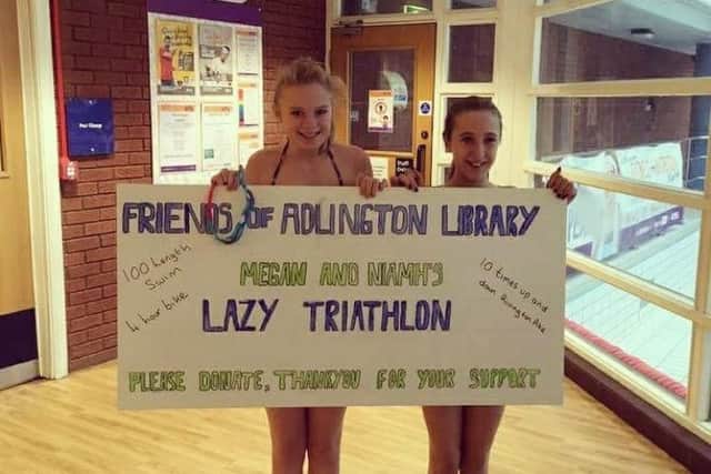Megan Whalley with friend Niamh McMoran-Elliot. The pair raised 920 for the Adlington Library fund