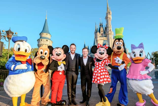 Ant & Dec with a host of Disney characters, at Walt Disney Resort in Florida