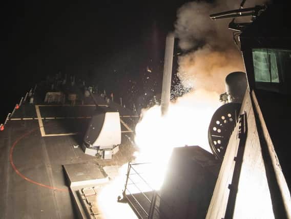 US Navy of USS Porter (DDG 78) firing a tomahawk land attack missile from the Mediterranean Sea, as Britain backed the US missile strike on a Syrian air base as an "appropriate response" to Bashar Assad regime's "barbaric" chemical attack. (PA File picture)