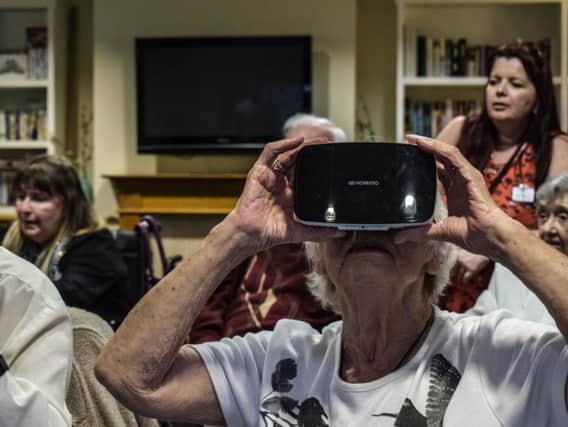 Residents at The Grange, in Buckshaw Village, try out a new VR trial  from PrimeVR