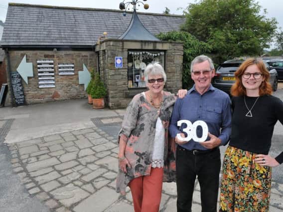 Sally and Paul O'Farrell are celebrating 30 years in business, with their daughter Kate