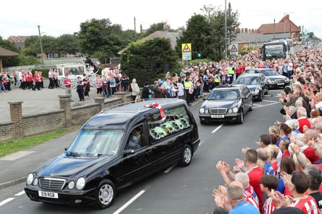 The funeral cortege leaves St Joseph's Church in Blackhall, County Durham