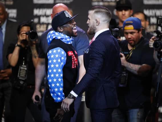 Conor McGregor and Loyd Mayweather swap verbals at press conference
