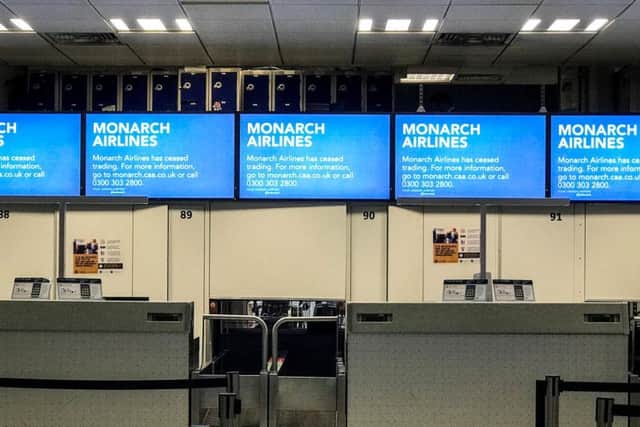 Empty check-in desks at Gatwick Airport after Monarch Airlines collapsed