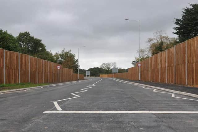 The new road includes 1,016m of sound barriers