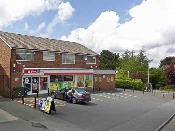 A male member of staff was assaulted during an armed robbery at the Spar