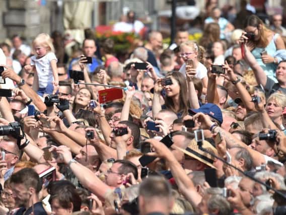 Should mobile phones should be banned at live music events?