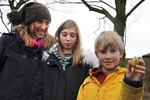 One of the first pebbles to be discovered, with Clare Jackson, Millie and Jacob Marsh.