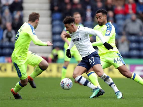 Callum Robinson in the thick of the action against Derby.