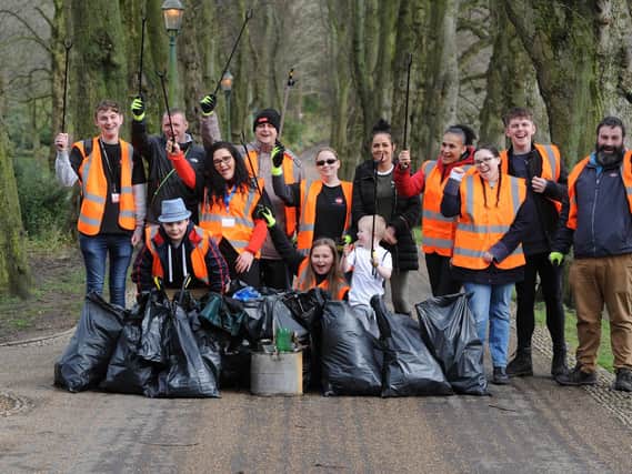 Volunteers and service-users of Red Rose Recovery taking part in a litter pick in Preston to help down boundaries and stigmas within the recovery community