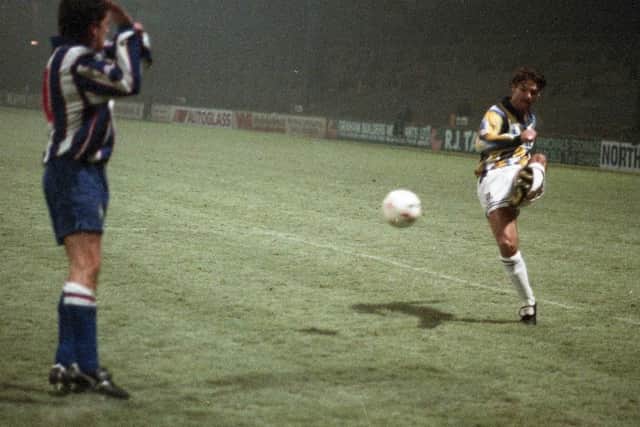 Tony Ellis puts over a cross in PNE's game at Huddersfield in 1993