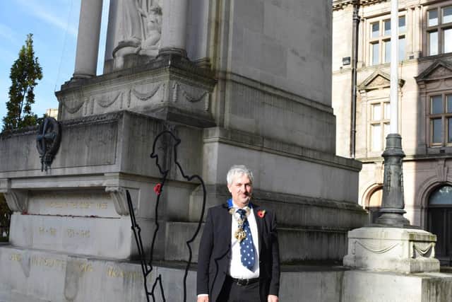 Preston mayor Trevor Hart with the Tommy figure at the war memorial