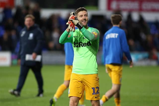 Paul Gallagher applauds the Preston fans at the final whistle