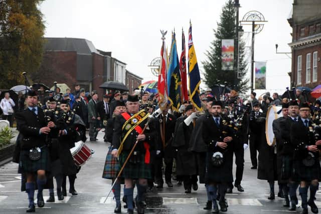 On to Park Road, to the entrance of the park where others waited patiently at the war memorial
