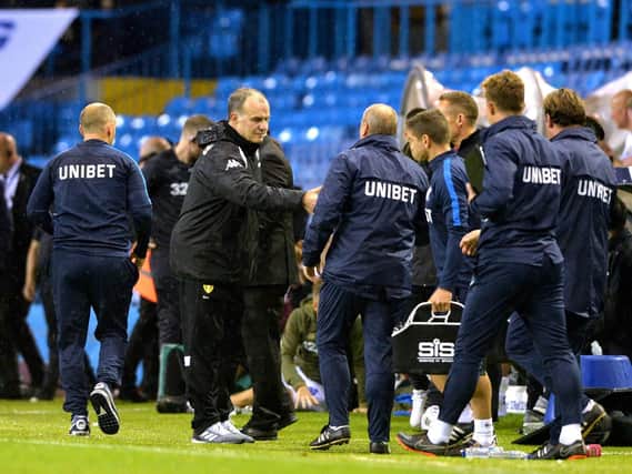 Leeds United boss Marcelo Bielsa shakes hands with Preston's backroom staff after the Championship game at Elland Road in September