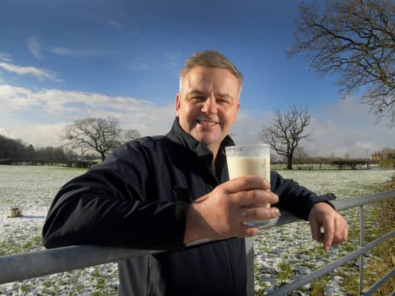 Graham Young, North West Dairy Board Chairman, savours a pint of milk