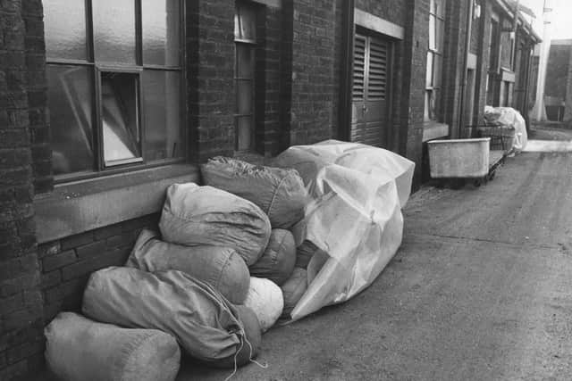 Bags of linen outside Royal Preston Hospital, piled up due to the Winter of Discontent
