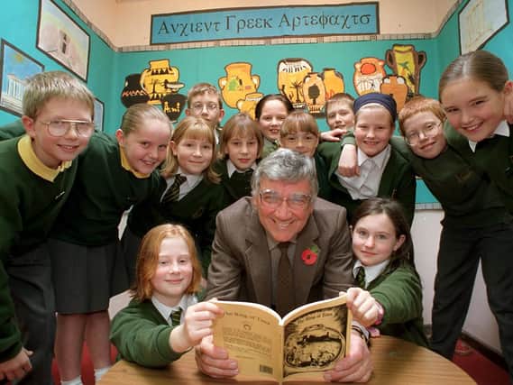 Author Gerald Rigby reads his book "The Ring of Tima" to year 6 pupils from St Oswald's RC primary school in Longton, near Preston
