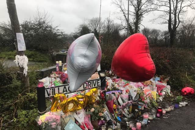 Some of the flowers and others tributes to Rosie Darbyshire