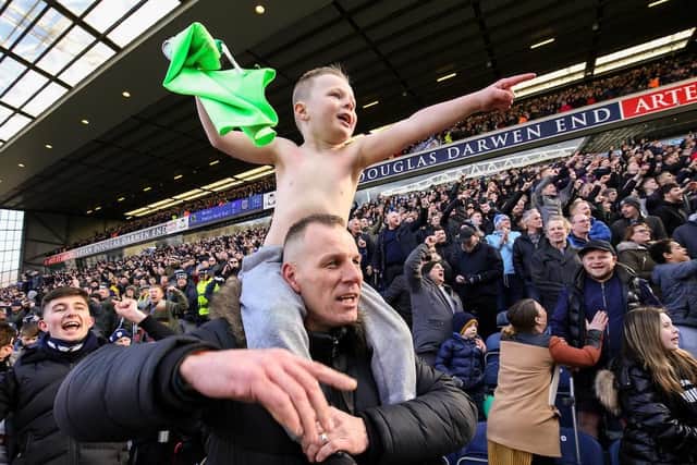 A young North End fan celebrates a day he'll remember in years to come.