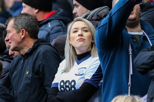 A North End fan takes in the atmopshere