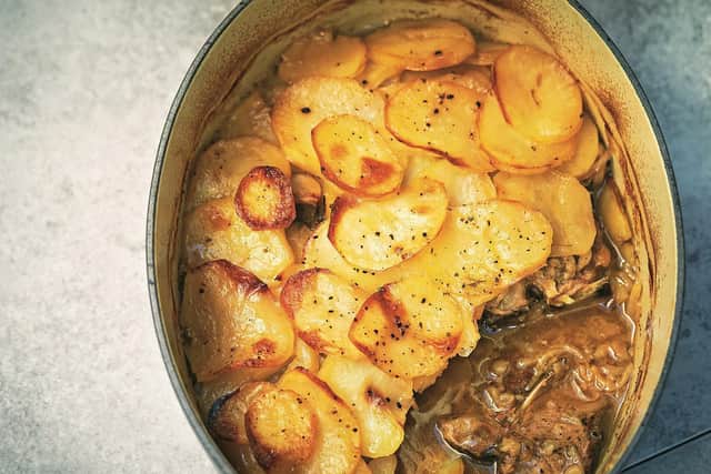 Lancashire hotpot is a stew originating from Lancashire in the North West of England. It consists of lamb or mutton and onion, topped with sliced potatoes and baked in a heavy pot on a low heat.