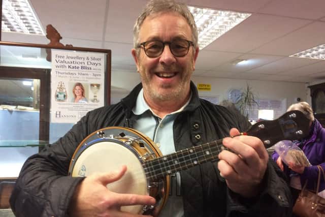 Anthony Mason with one of George Formby's ukuleles
