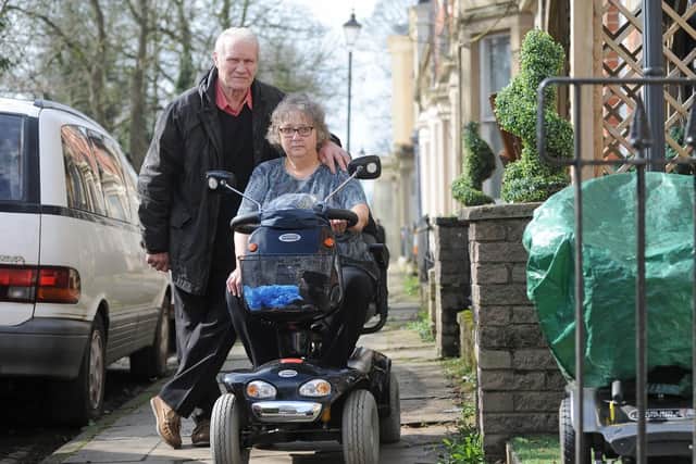 Bernard Forde is furious with Preston Council after they took all the bins away from Bank Parade. He is pictured with his wife Carol.
