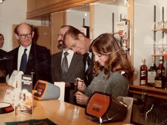 Teresa Wilson serves Prince Philip a flat pint in 1979 at Preston Rehabilitation Centre, Dovedale Avenu, Ingol