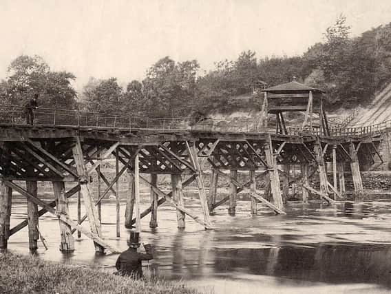 Tram Bridge during its days transporting coal across the Ribble. The tracks can be seen leading up to Avenham Park
