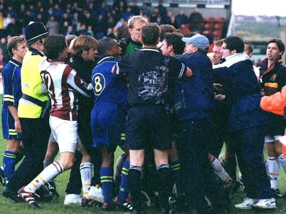 Preston and Northampton Town players clash at the final whistle at Sixfields Stadium in October 1998