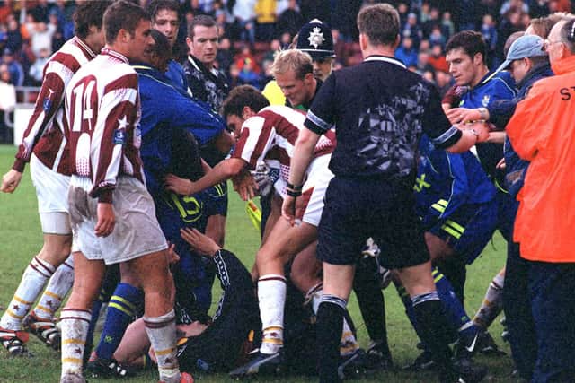 The melee involving Preston and Northampton at the final whistle at Sixfields in 1998