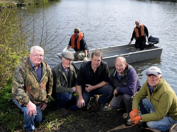 Environment Agency and Withnell Angling Club teaming up to bring siltex to Farington Lodges Recreation Ground to break up silt in the water (Images: JPIMedia)