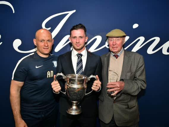 PNE midfielder Alan Browne collects the Sir Tom Finney Trophy in 2018 from Alex Neil and Trevor Hemmings