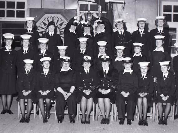 The best all-round unit in the UK, Preston 45th Unit Girls' Nautical Training Corps, shows of its coveted Mountbatten Trophy, proudly held by commanding officer, First Officer Denise Gravestock (left) and Second Officer Joyce Maxfield