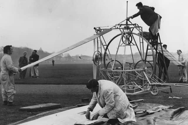Team preparing Willie Wilson's Gyro Bike for its attempt at flight