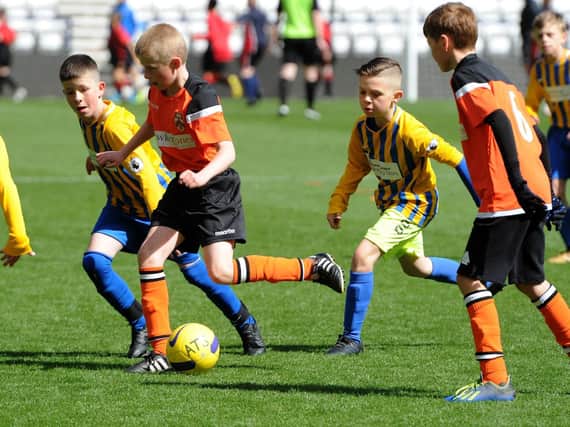 Action from Broughton Primary v Lea Endowed in the Harold Slater Shield Final at Deepdale