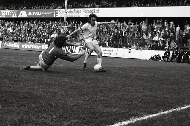 Preston striker Mike Elwiss is challenged by the Port Vale keeper