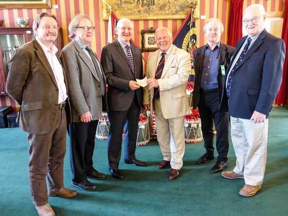 The cheque presentation by Preston Pals at the Lancashire Infantry Museum :(L to R): Simon Mather, Aidan Turner-Bishop, Andrew Mather (presenting cheque), John Downham (receiving cheque), Robin Utracik and Trevor Kirkham.
Photo by Roger Goodwin