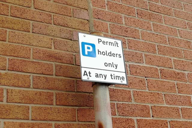 At one end of Royle Road, the sign suggests all permit holders can park...