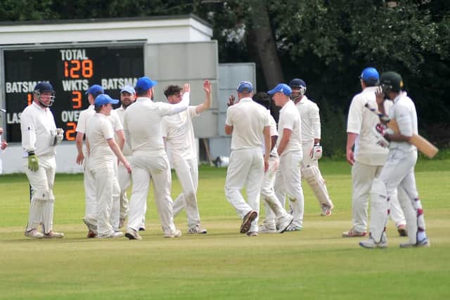 Penwortham celebrate a wicket against Preston at West Cliff