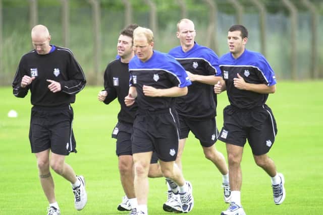 Tepi Moilanen, Sean Gregan, Rob Edwards, Colin Murdock and Brian Barry-Murphy on the run in 2001
