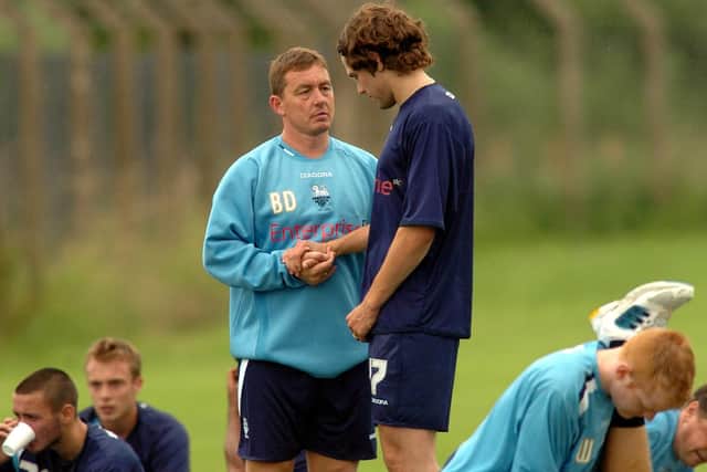Billy Davies shares a moment with Eric Skora in 2005