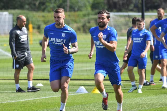 Patrick Bauer and Joe Rafferty take part in a training run
