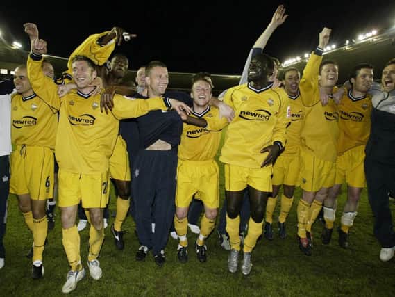 The PNE squad celebrate after their play-off semi-final aggregate win over Derby in 2005