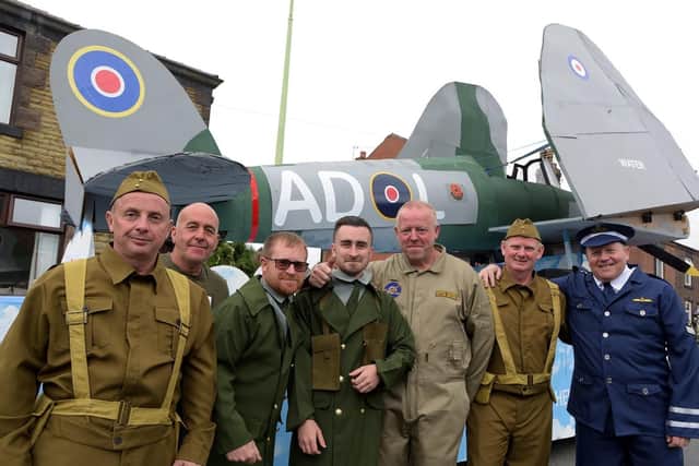 The Spitfire builders of D'Day Squadron take part in Adlington Carnival