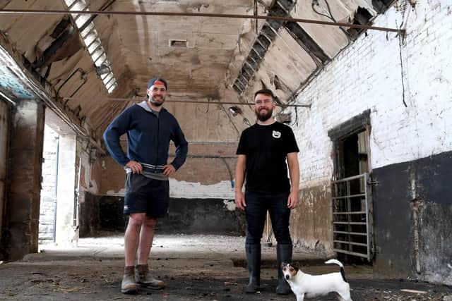 Ben Stubbs and Mike Richardson in the barn that will be converted (JPIMedia)