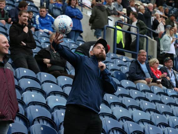 Preston beat Newcastle 2-1 in the rain at Deepdale. Here are a selection of photos of fans who braved the weather.