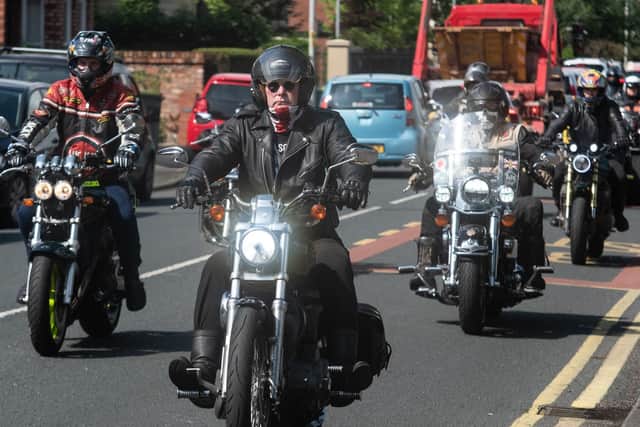 Bikers join the procession to the crematorium for the funeral of Paul Pearson.